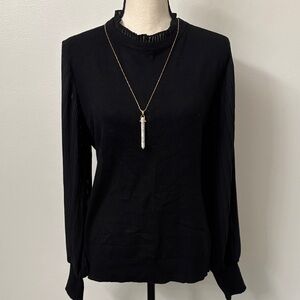 Sioni Black Sweater with shear arms.